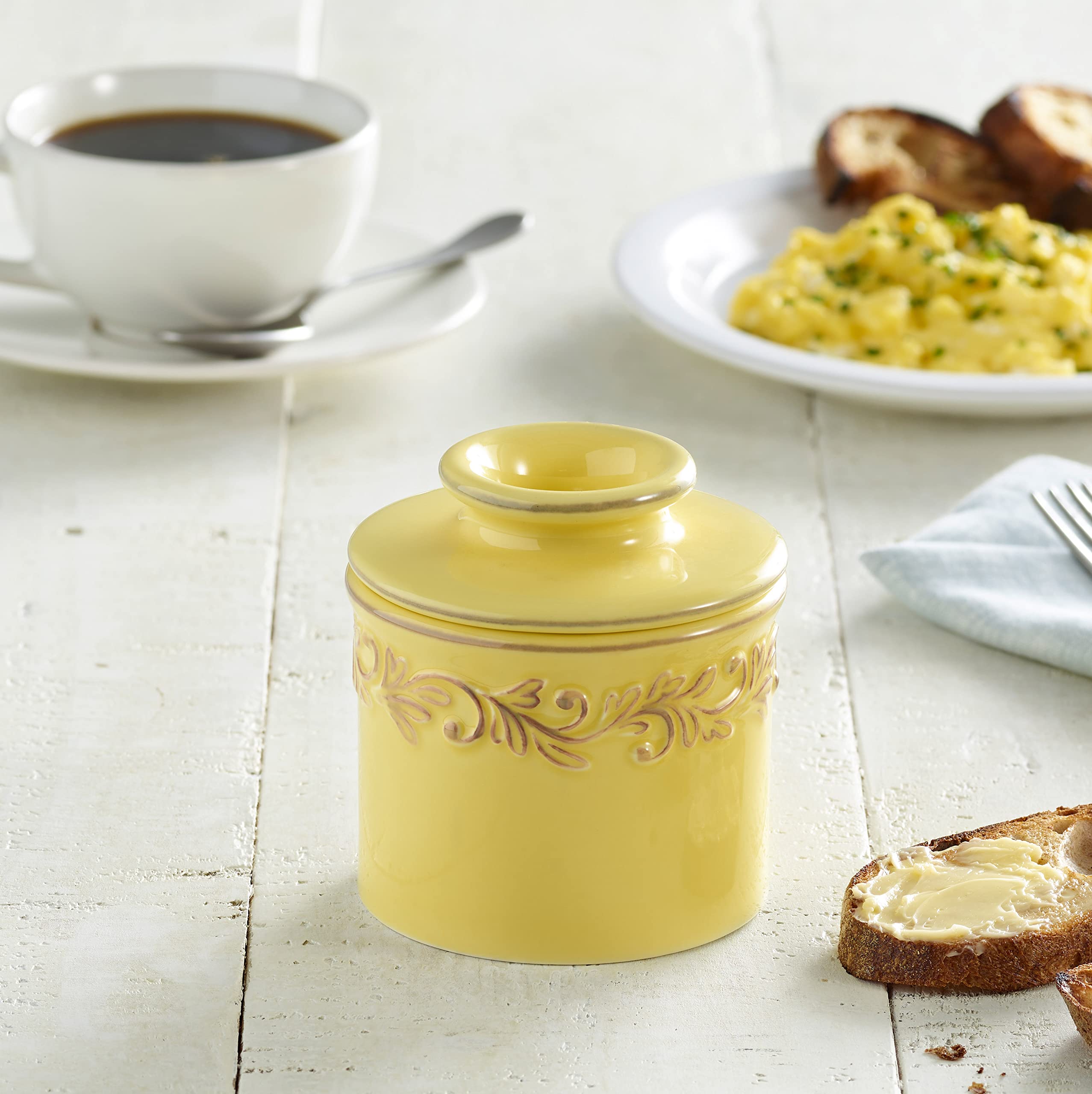 Butter Bell lid filled with butter demonstrating secure fit and simple packing benefit