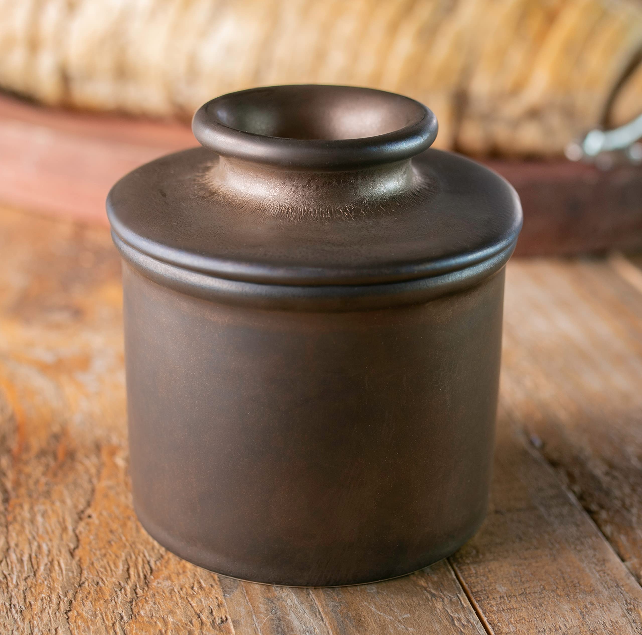 Butter Bell open with butter-packed lid demonstrating easy filling and ready-to-serve benefit
