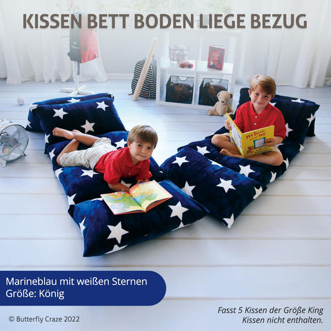 Butterfly Craze cover filled with pillows in living room showing cozy lounge use