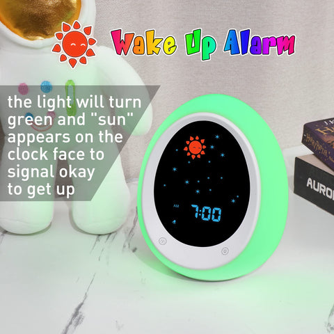 BUTTING close-up of sun and moon icons teaching sleep versus wake visually