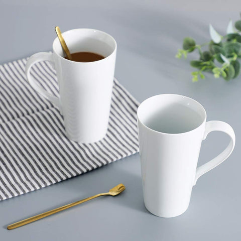 Buyajuju mug in use with coffee pour demonstrating large 16 oz capacity benefit