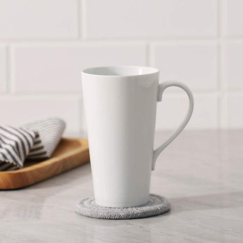 Buyajuju mug held in hand for size comparison showing practical everyday portion