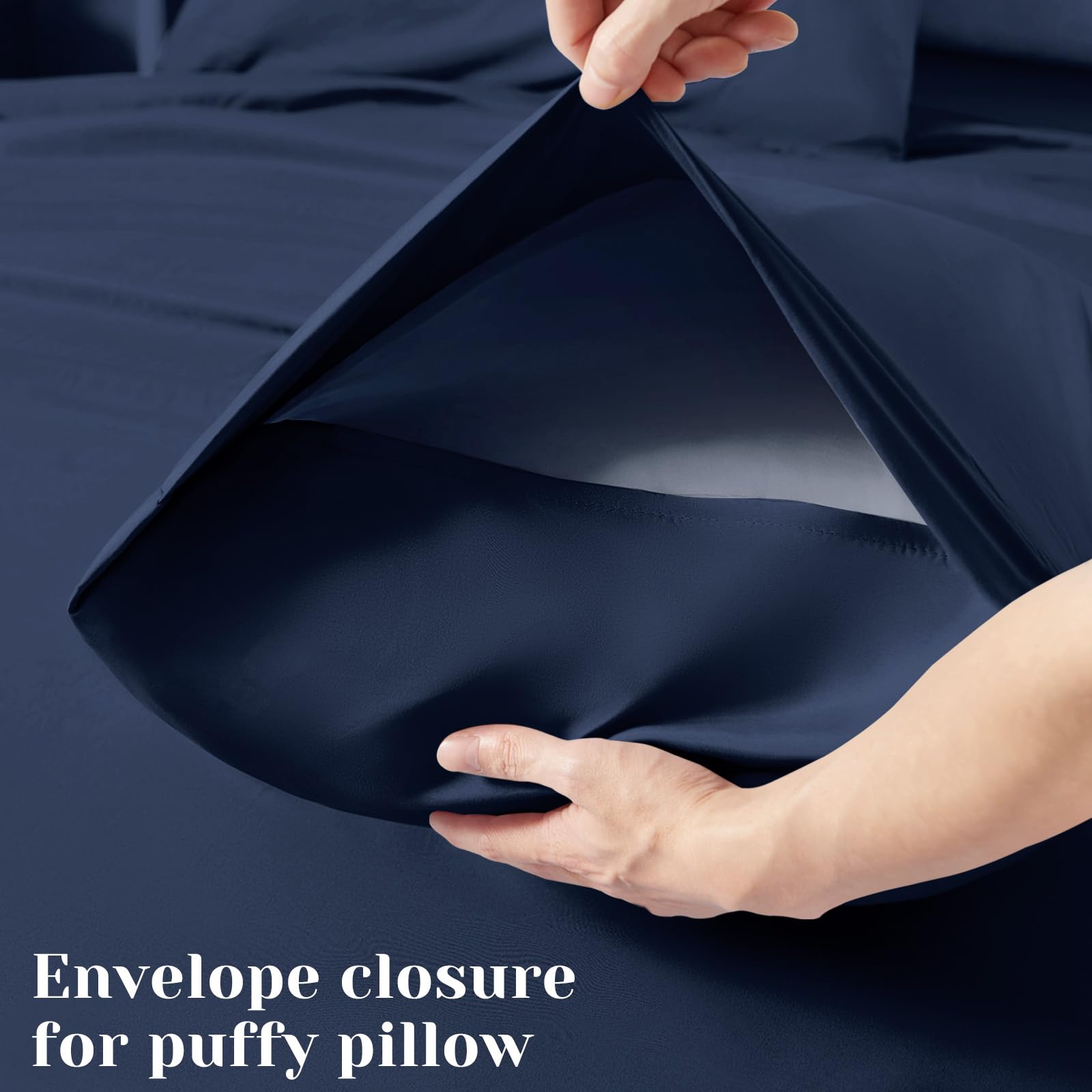 BYSURE bed made up in navy sheets showing hotel-style look