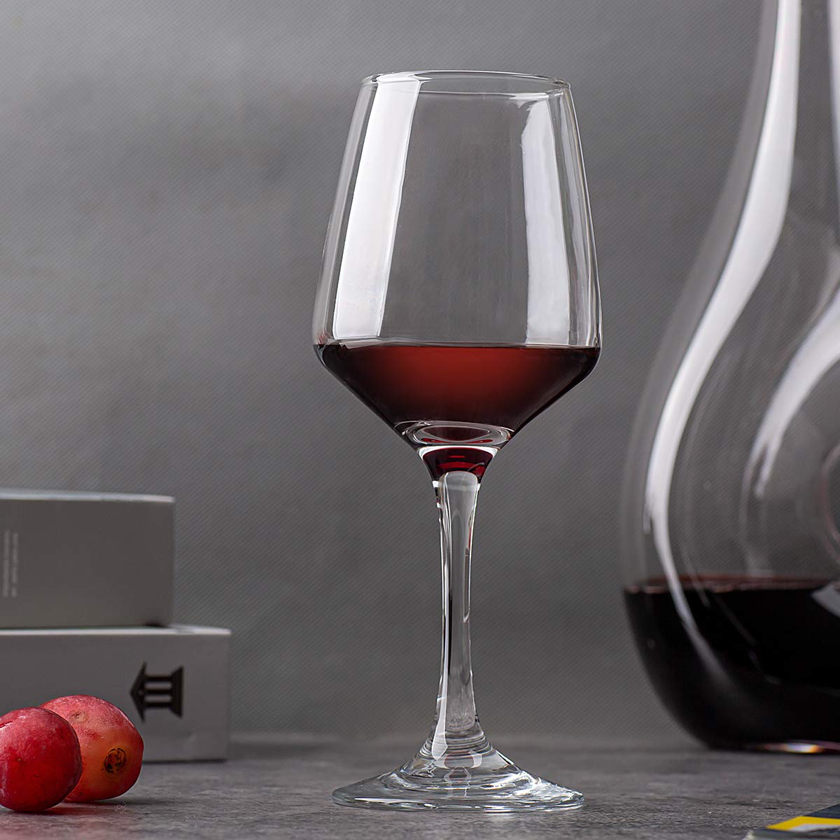 C CREST glass held in hand showing lightweight durable handling benefit