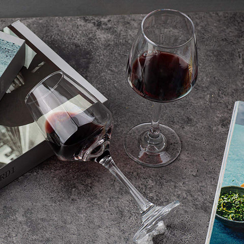 C CREST two glasses filled with red wine showing color clarity benefit