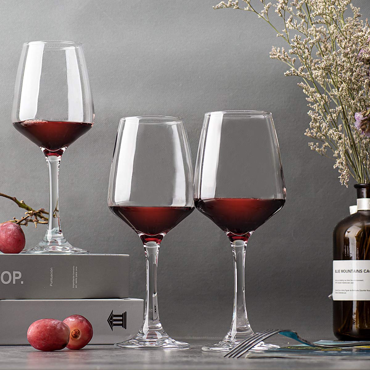 C CREST glasses on a dinner table showing stylish entertaining benefit