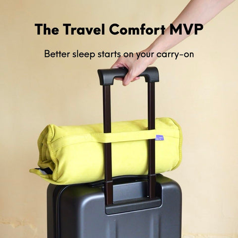 C CUSHION LAB pillow on a hotel bed showing comfortable sleep setup away from home benefits