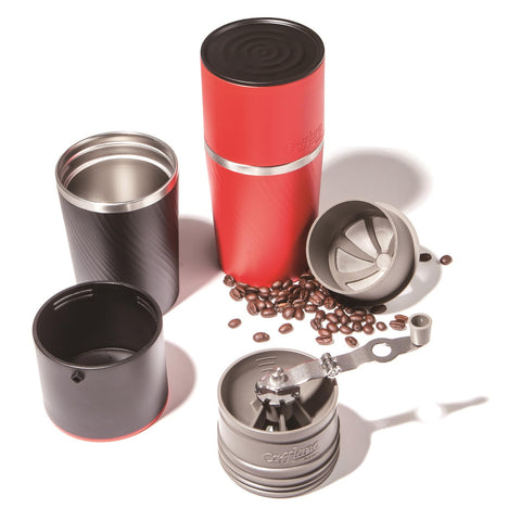 Cafflano Klassic held in hand for size comparison showing lightweight travel friendliness