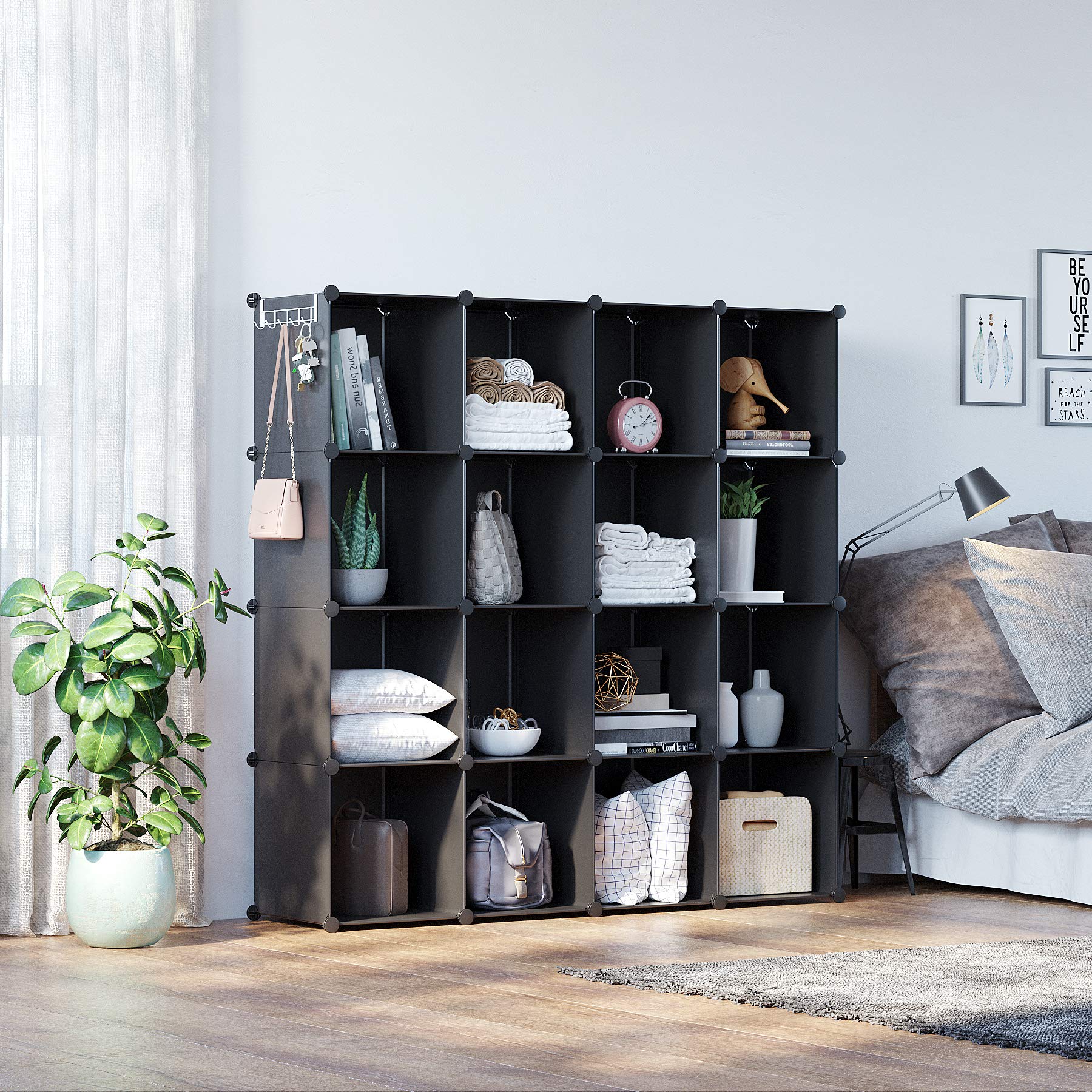 C&AHOME interior cube filled with books and bins demonstrating organized storage