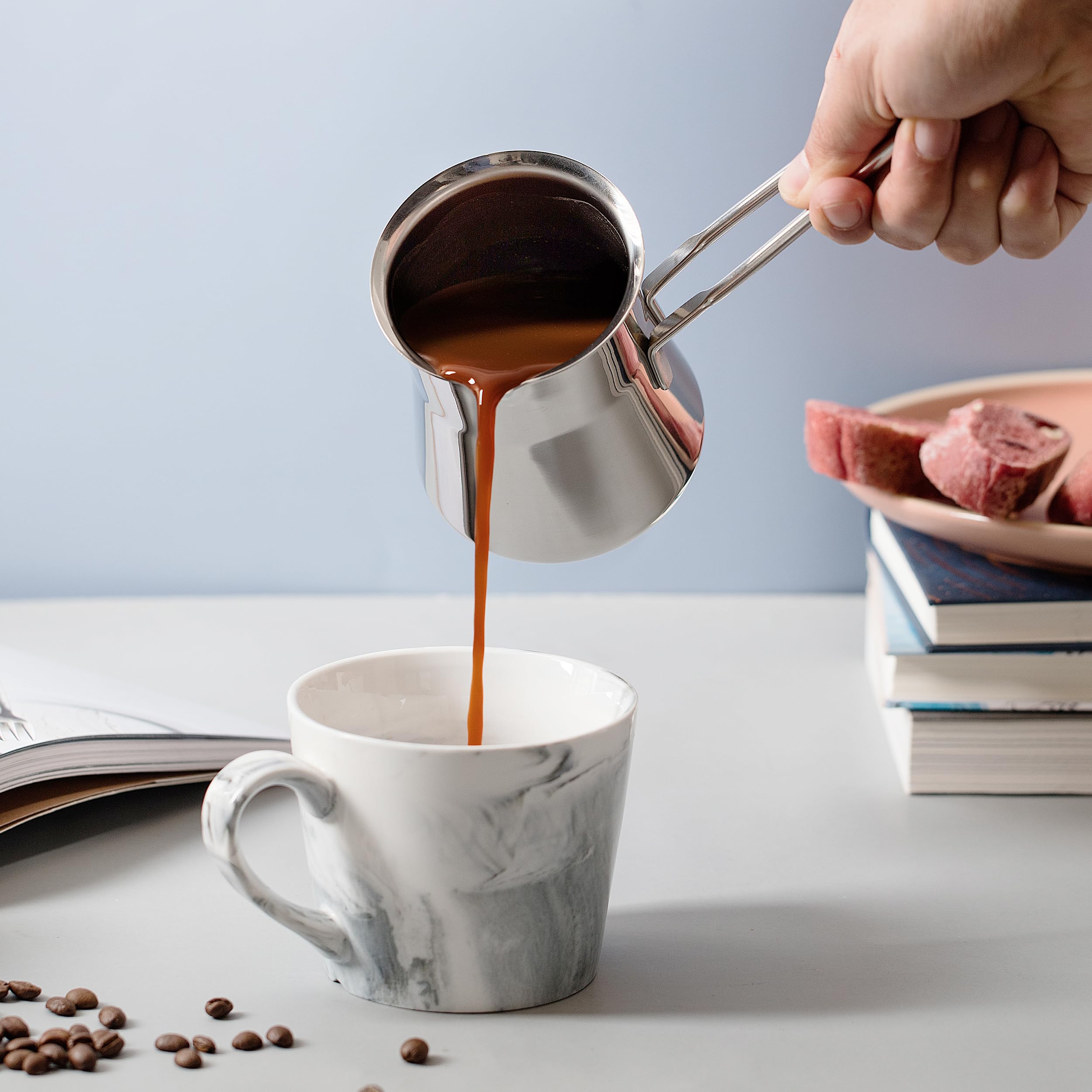 Caizen Coffee briki heating on gas stovetop for even brewing