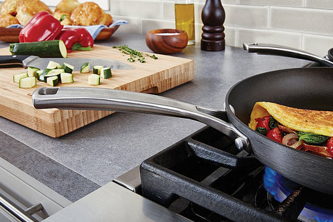 Calphalon Classic close-up of stainless steel handle and flared rim offering a secure grip