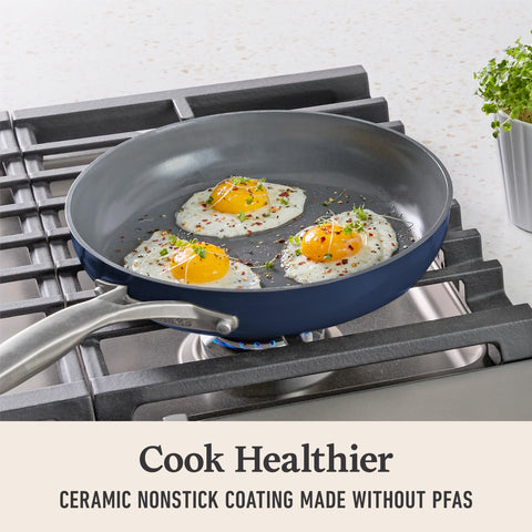 Calphalon stainless steel handle detail showing cool-touch grip and sturdy attachment