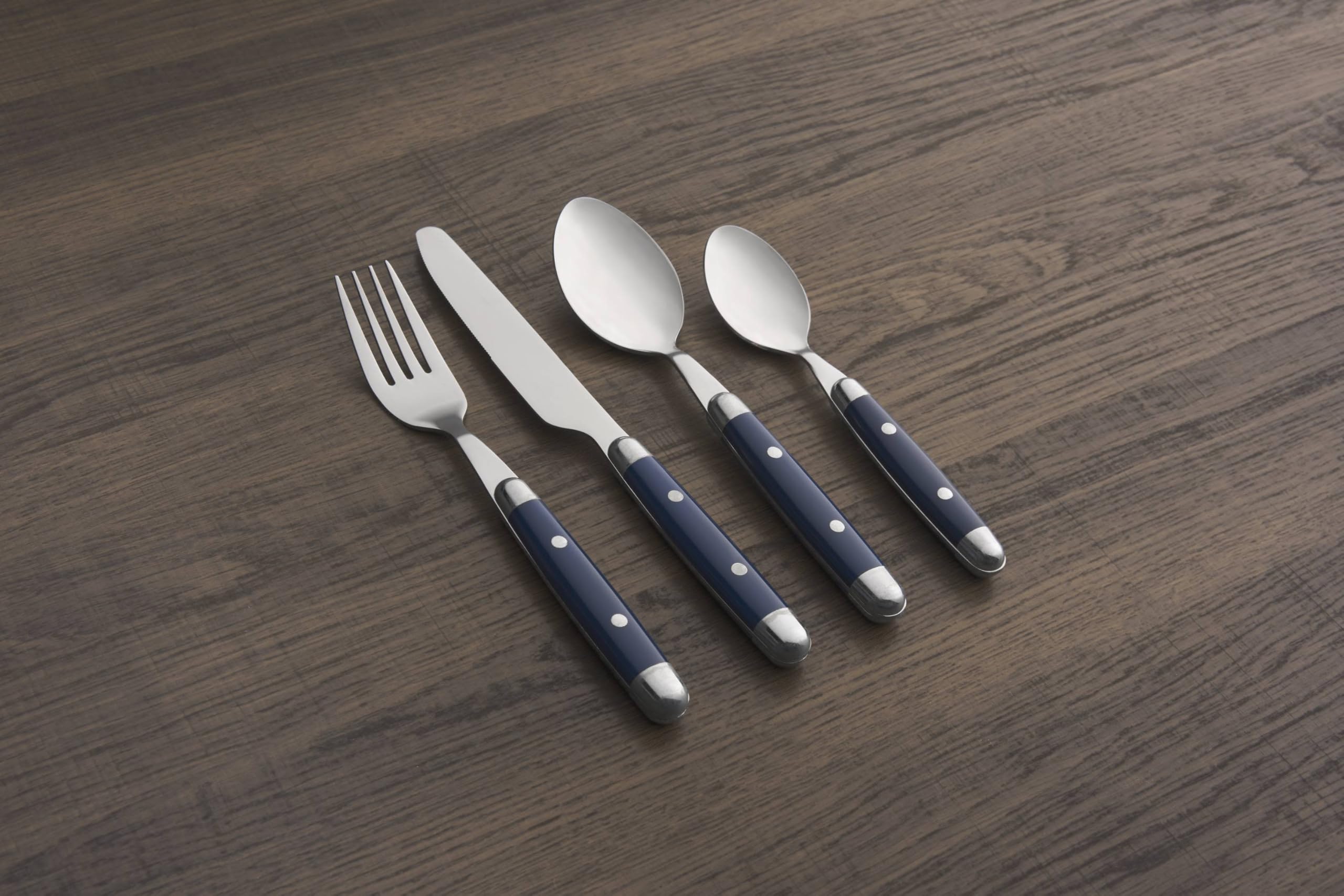 Cambridge Jubilee Blue next to a plate for scale, shows practical utensil size