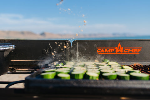 Camp Chef griddle beside utensils to show size comparison and crowd-ready capacity