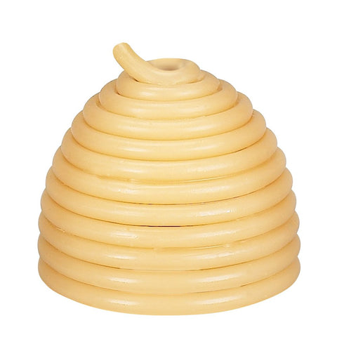 Candle by the Hour burning on a table with spring clip, showing controlled long-burn benefit