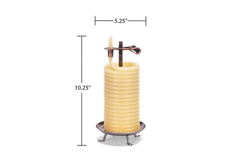 Candle by the Hour lit on a tabletop, ambient warm light for cozy atmosphere