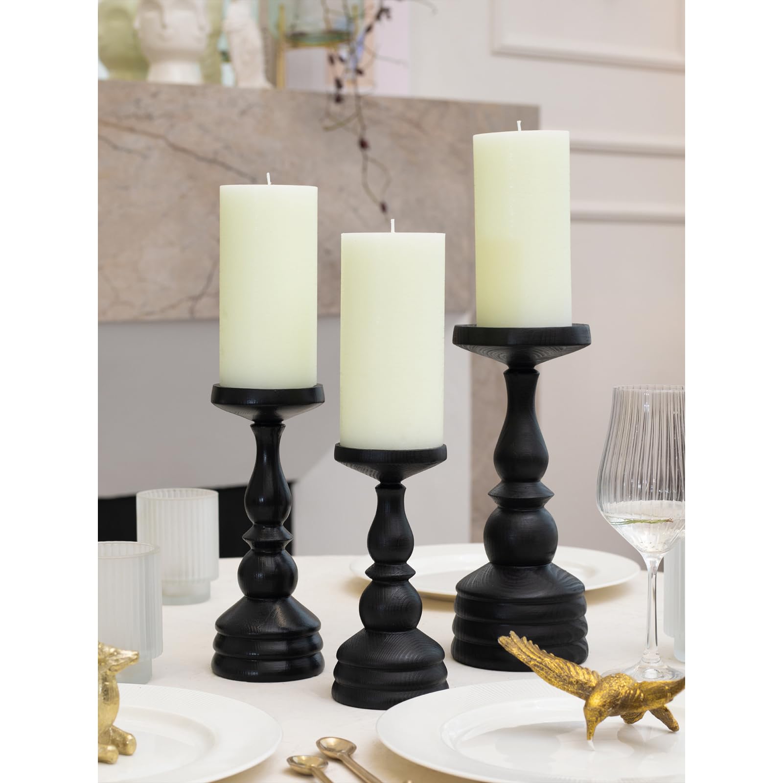 CANDWAX lit pillar candle in use conveying steady flame and warm ambiance