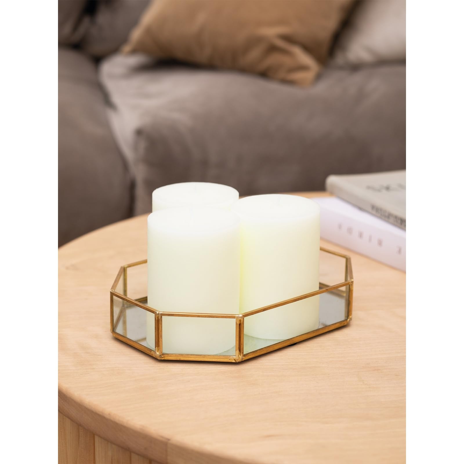 CANDWAX single pillar in a decorative holder as a tabletop centerpiece idea