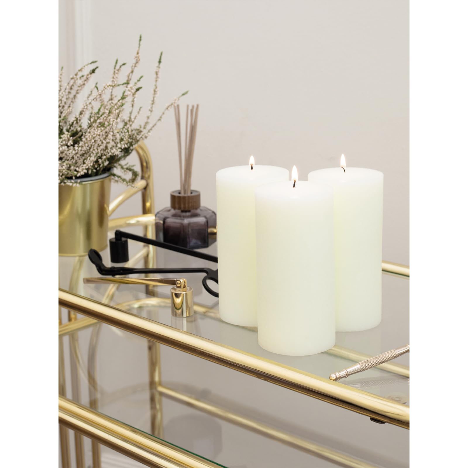 CANDWAX wedding table centerpiece with pillars creating elegant neutral decor