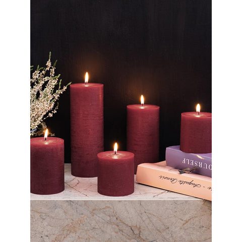 CANDWAX candle held next to a hand showing scale benefit: clear size reference