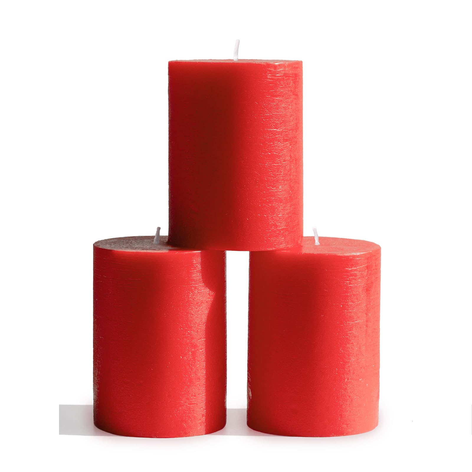 CANDWAX front view of three red pillar candles showing solid color and shape benefit