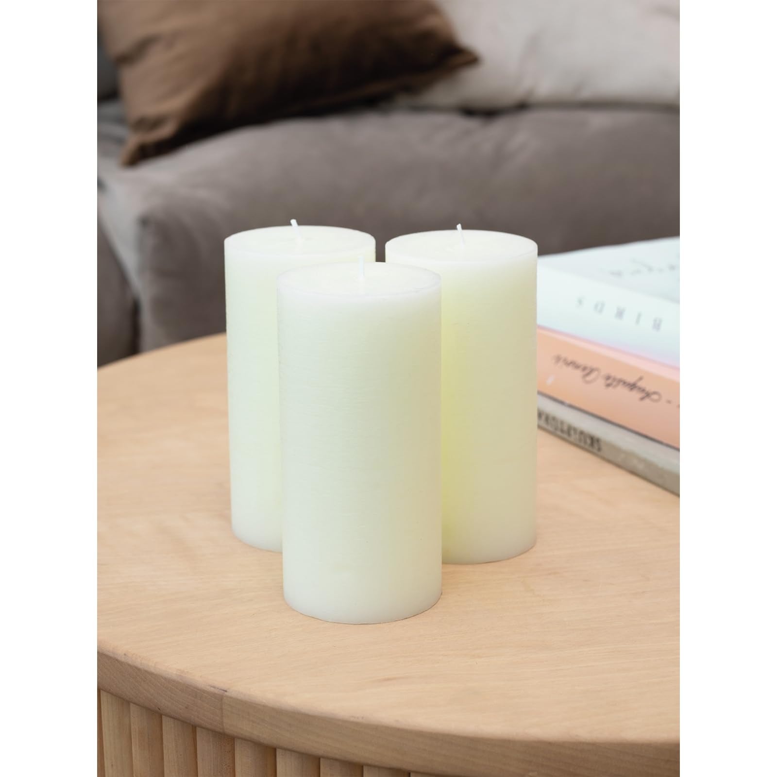 CANDWAX pillar held in hand showing true 3x6 size for planning displays