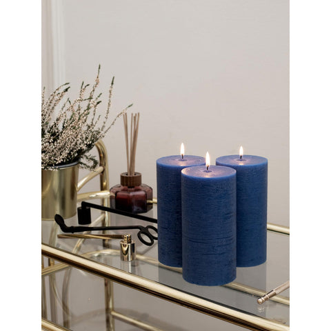 CANDWAX three pillars arranged in holders showing stable display and decorative use