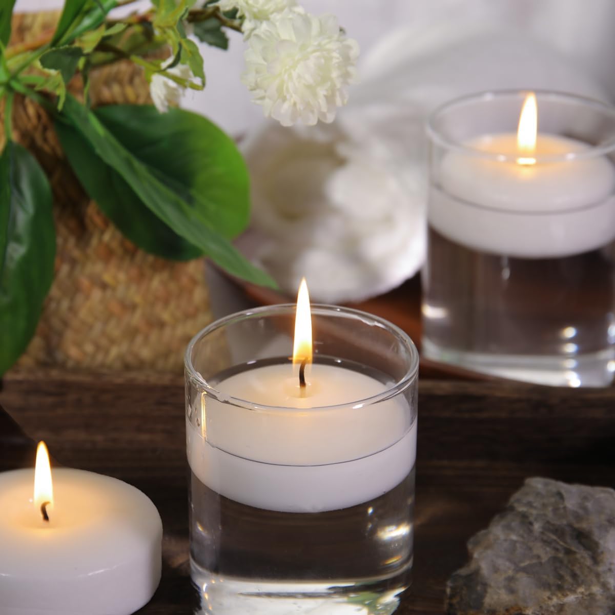 Capaniel candles floating in bathtub, calming spa-like relaxation benefit