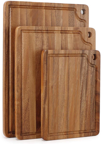 Caperci front view of three acacia boards showing sizes and finish, ideal for prep