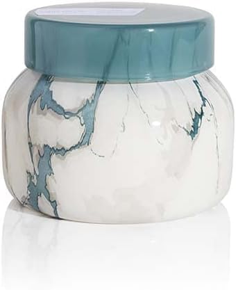 Capri Blue Modern Marble front view showing jar and Volcano scent benefit