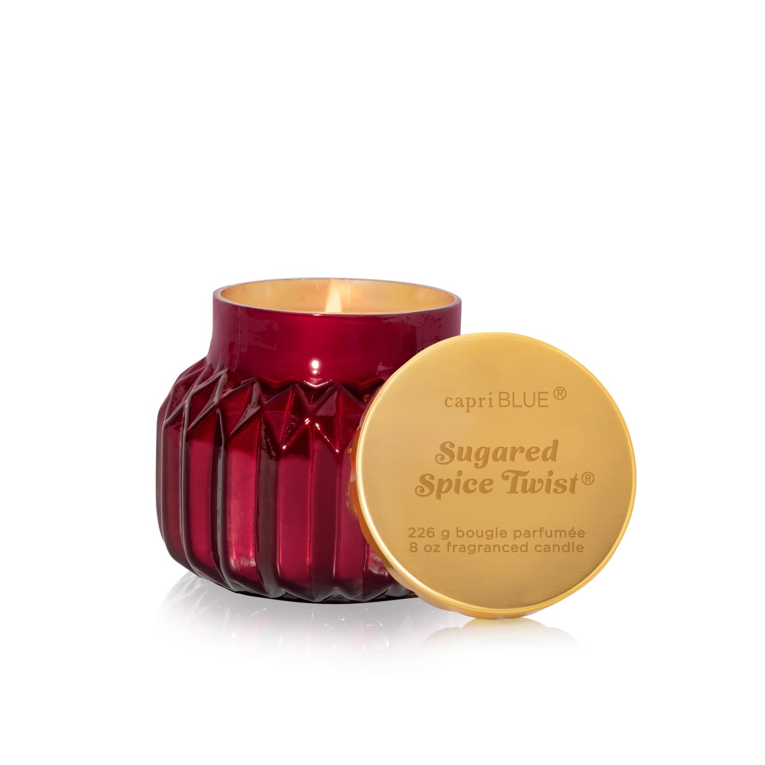 Capri Blue front packaging showing holiday jar and scent benefits