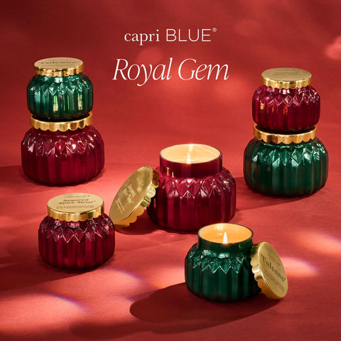 Capri Blue candle styled on tabletop adding seasonal decorative aroma