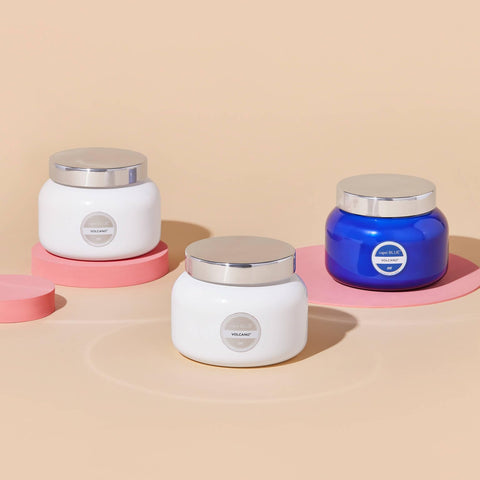 Capri Blue label on white jar highlighting branding and premium presentation