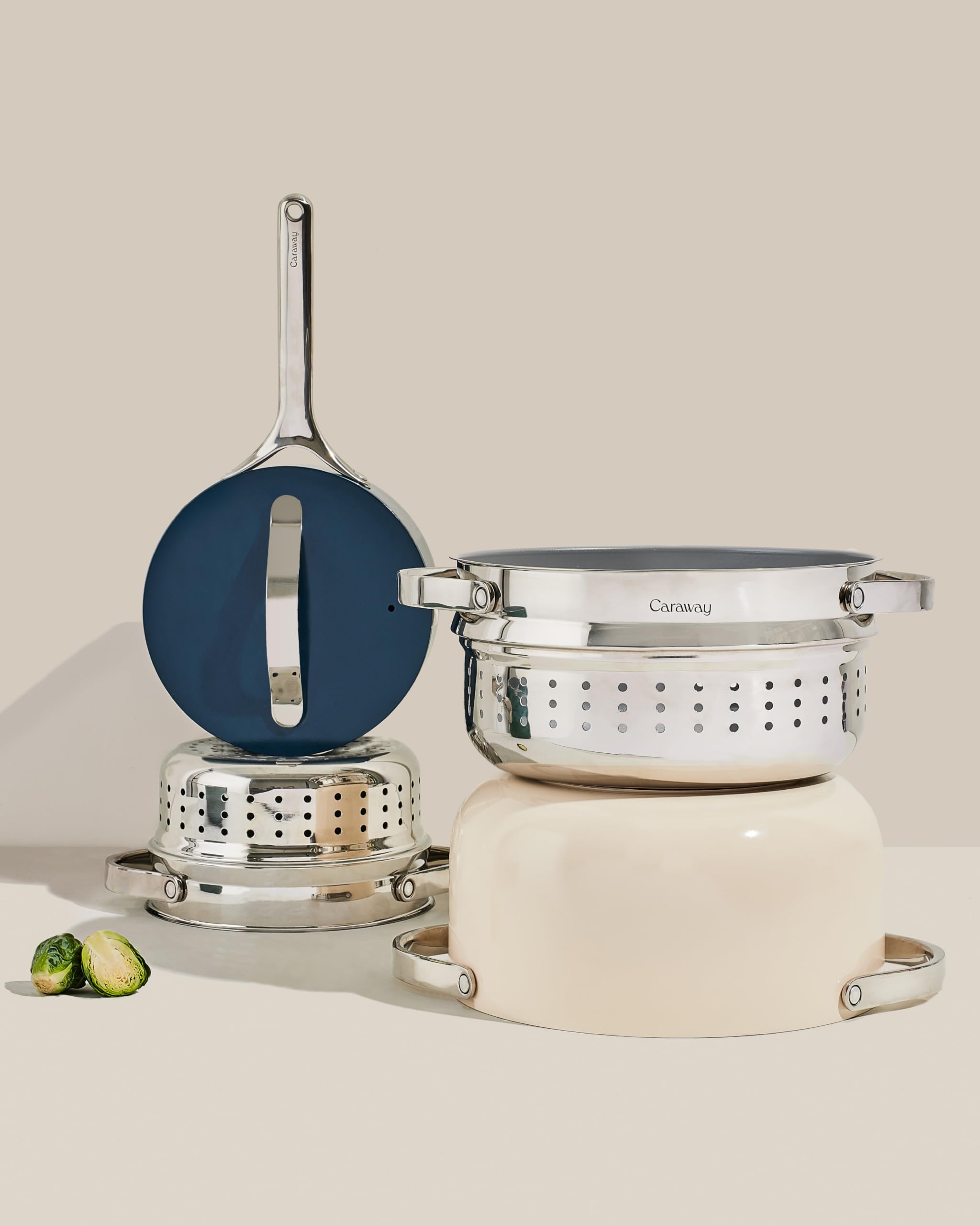 Caraway steamer next to measuring tools showing scale and capacity for meal prep