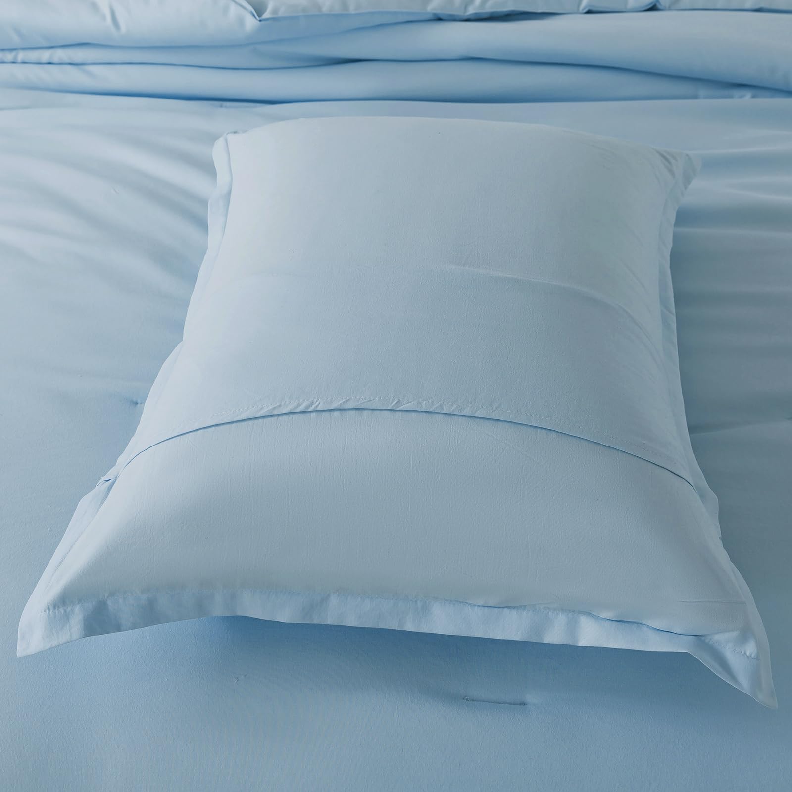 Caressma comforter styled in bedroom scene, presents relaxed boho decor appeal