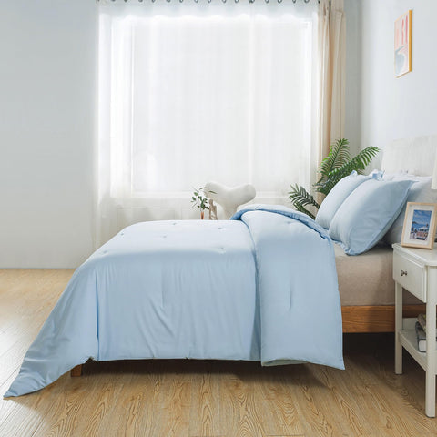Caressma comforter on a twin bed in a bedroom setting conveying cozy boho style