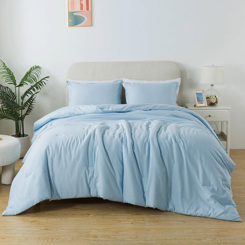 Caressma front packaging showing neat folded twin comforter and calm blue color for easy setup