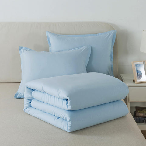 Caressma vacuum-packed comforter being unboxed to show compact shipping and quick fluffing