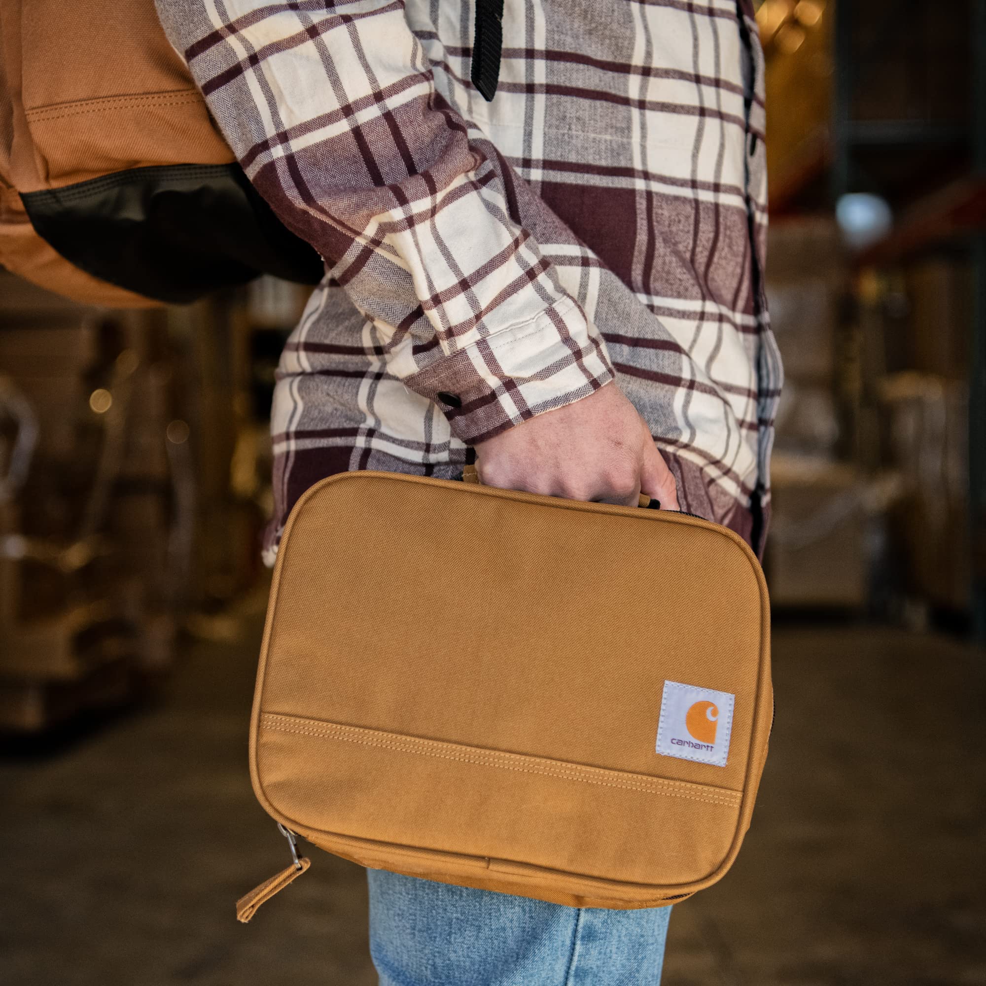 Carhartt lunch cooler in use at worksite keeping food organized and accessible