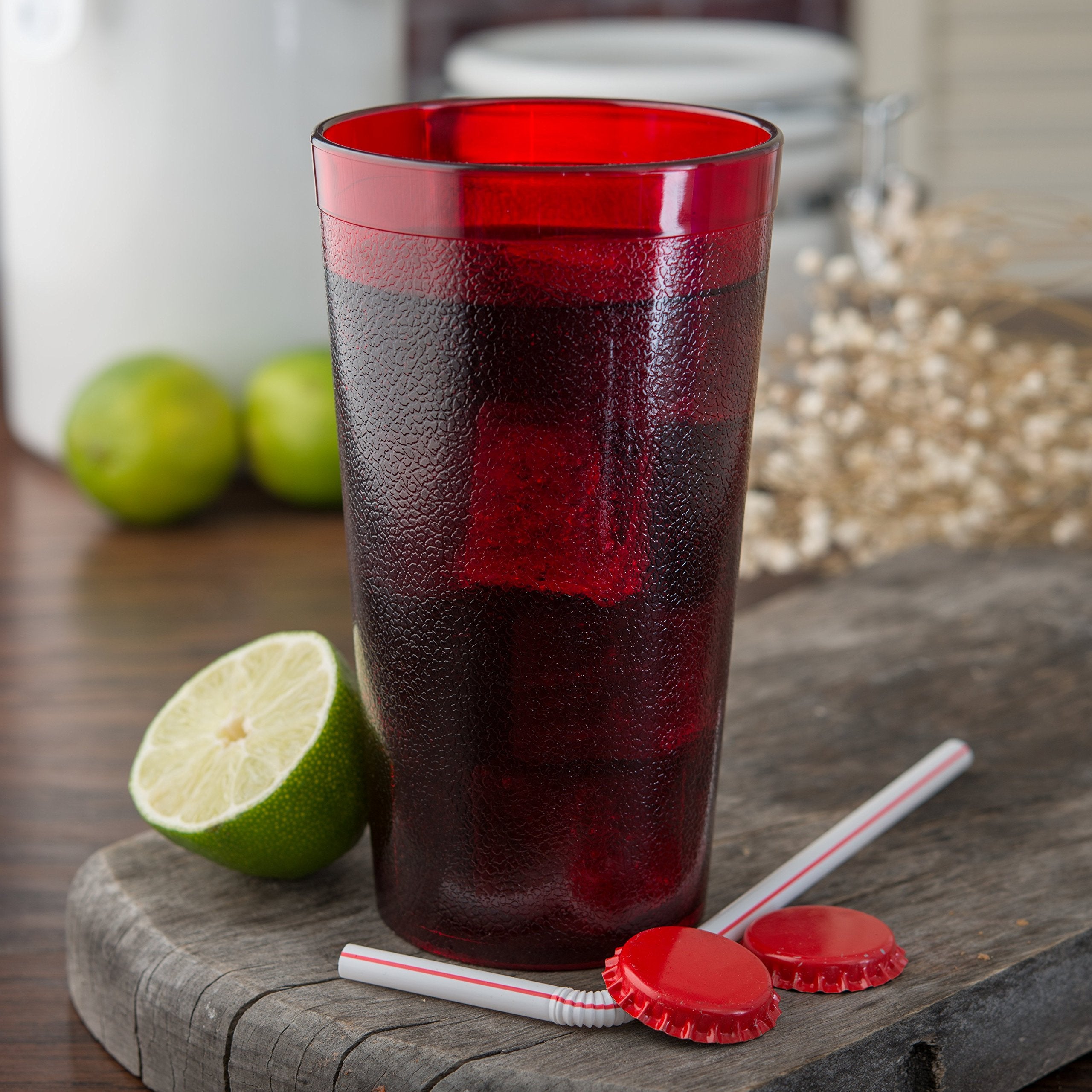 Carlisle tumbler filled with iced tea demonstrating beverage capacity