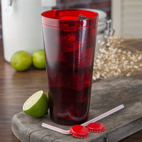 Carlisle tumbler held in hand showing 26.5 oz capacity scale