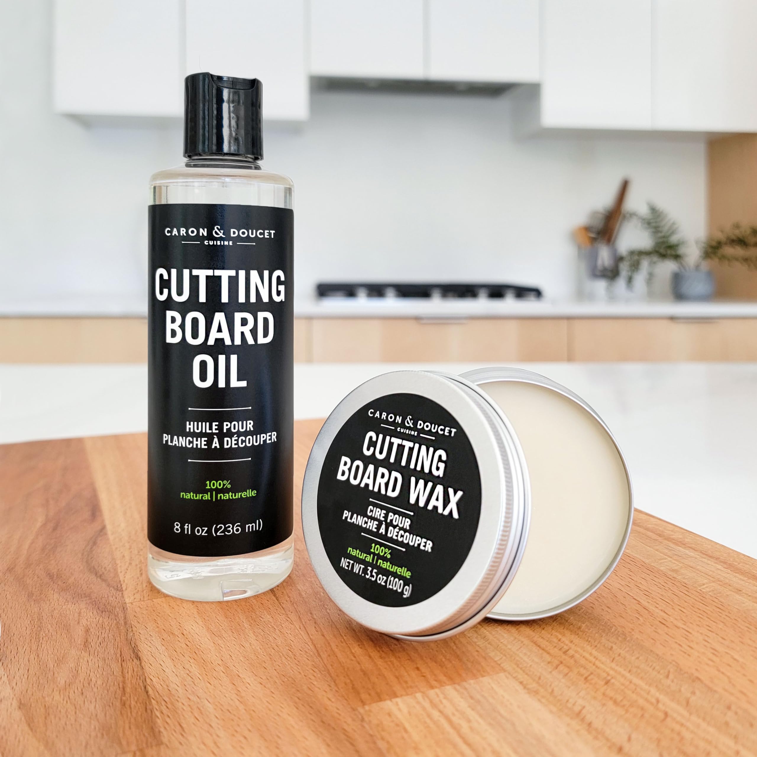 Caron & Doucet applying oil with cloth to restore butcher block life