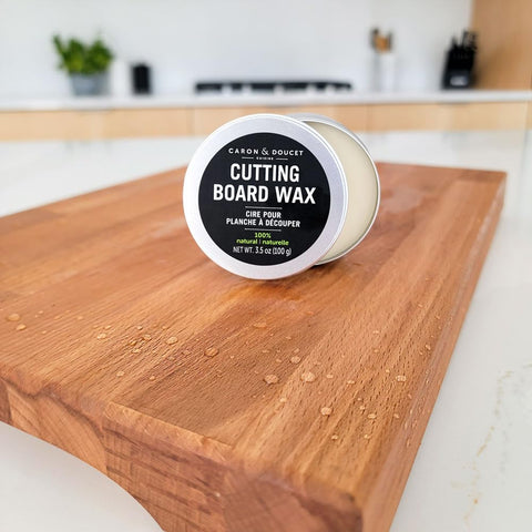 Caron & Doucet oil and wax next to ruler to show product sizes