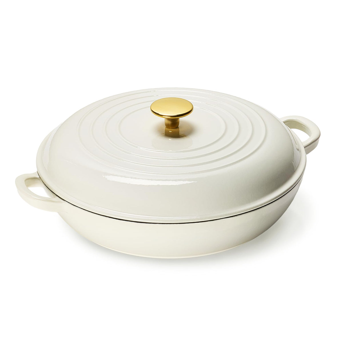 CAROTE braiser front view showing white enamel and handles, durable cookware benefit