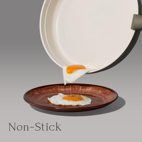 CAROTE detachable handle attached to pan for quick removal and storage