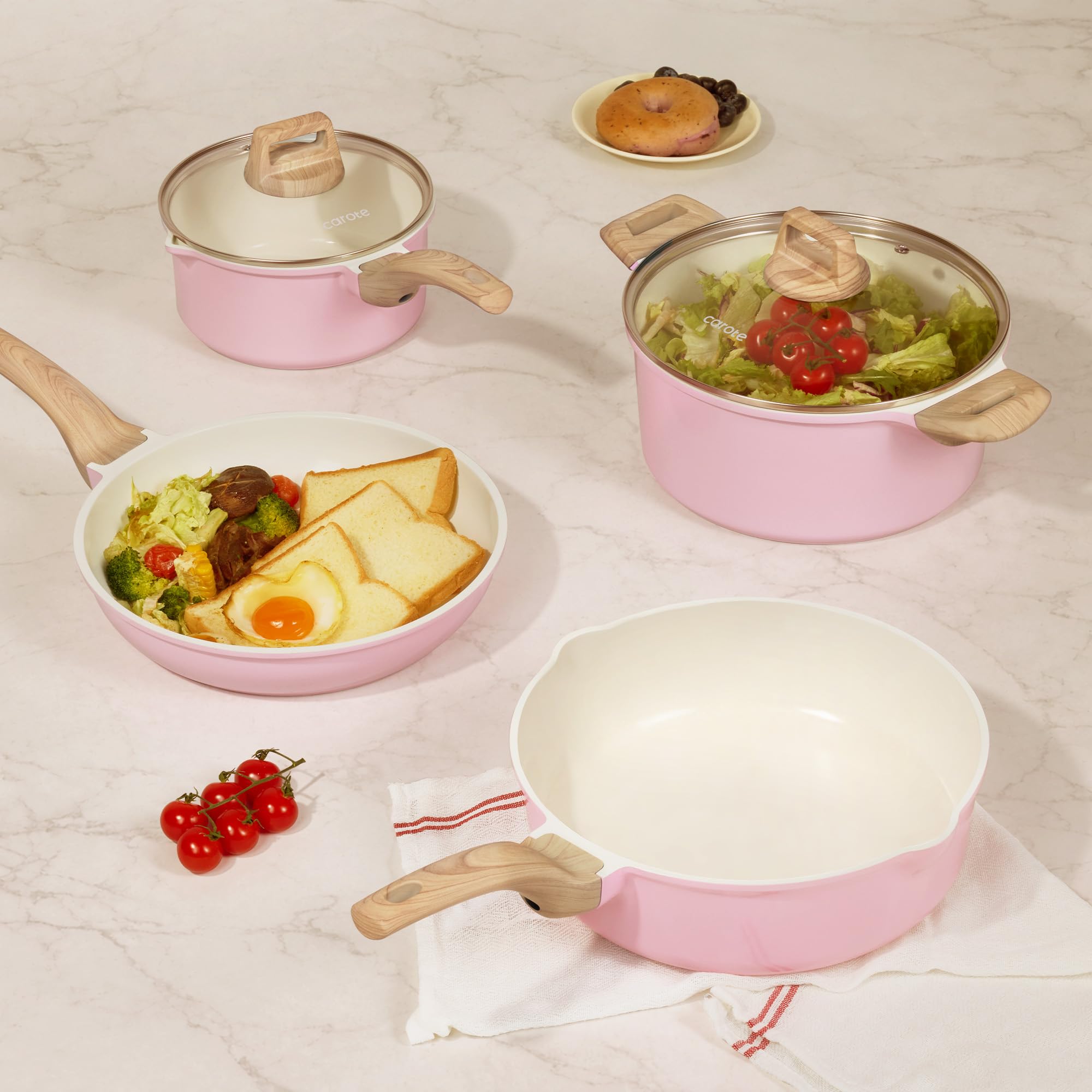 CAROTE lifestyle kitchen pink display showing stylish cookware enhancing decor