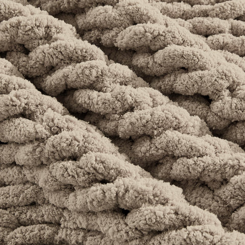 Carriediosa artisan hands knitting blanket showing handmade authenticity benefit