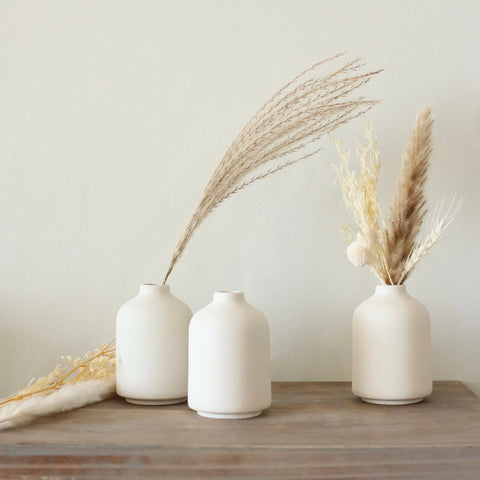 Carrot's Den styled shelf vignette with vases showing lifestyle integration and subtle decorative impact