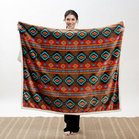 Carstens throw draped on sofa adding rustic color and cozy layering