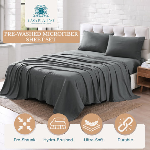 Casa Platino charcoal flat sheet fully spread on bed offering full coverage and modern look